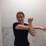 Photo 3 - Crossover Arm Stretch