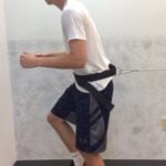 Photo 3. Single leg stance on stability disc with sports cord